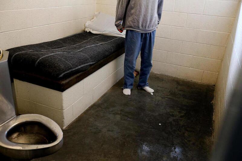 FILE— A youth stands in his room at the Salt Lake Juvenile Detention Center in Salt Lake City on Friday, Feb. 5, 2016.