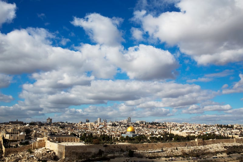 Clouds hang over Jerusalem's Old City, home to key holy sites for the world's three monotheistic religions, Thursday, Dec. 7, 2017. The densely packed area, less than one square kilometer (one-third of a square mile), hosts the Western Wall and the adjace