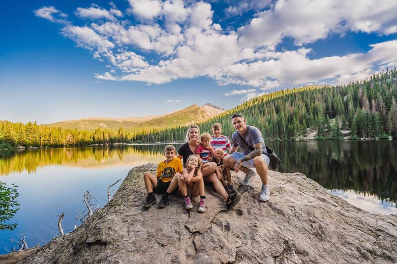 Vacations are an extended family affair for Josh and Erica Hartwig and their kids. Her brother, who took the photo, usually comes along — and they often travel with her ex-husband's parents, siblings and their kids.