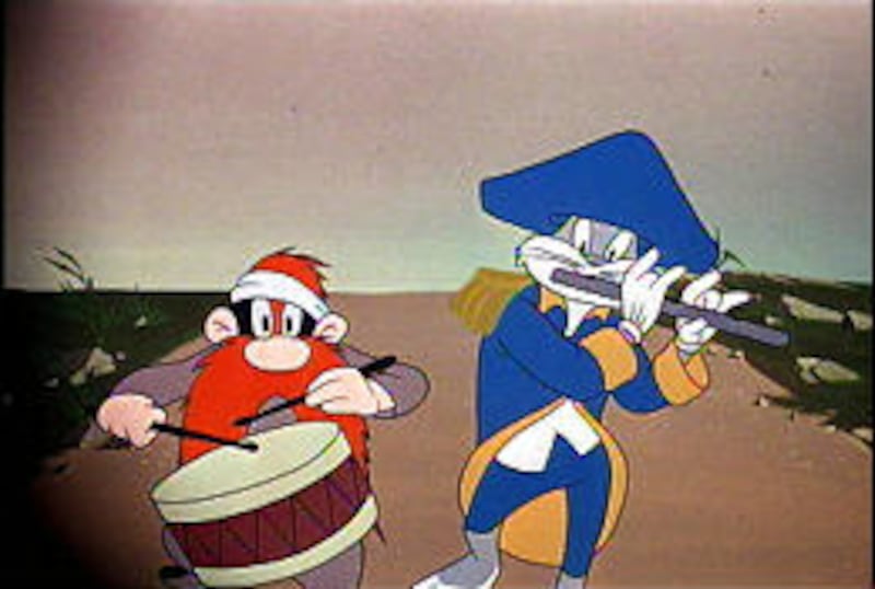 Cartoon characters Yosemite Sam and Bugs Bunny are shown in a scene from "Looney Tunes: Golden Collection," a four-disc compilation.