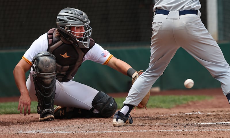 Juab catcher Wyatt Payton reaches for a pitch