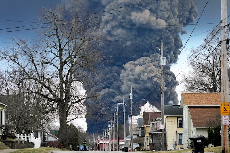 A black plume rises over East Palestine, Ohio.