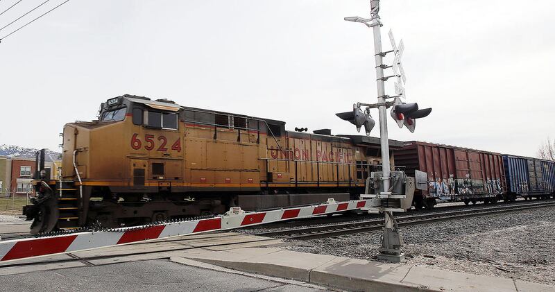 FILE - A Union Pacific train on Feb. 18, 2014. A woman run over by a Union Pacific train early Thursday had an arm and a leg severed but is expected to survive, according to Salt Lake police.