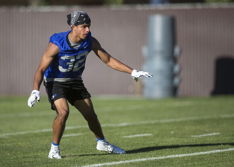 Defensive back Chris Wilcox practices his moves at the BYU Cougars' first practice of the season in Provo on Thursday, July 27, 2017.