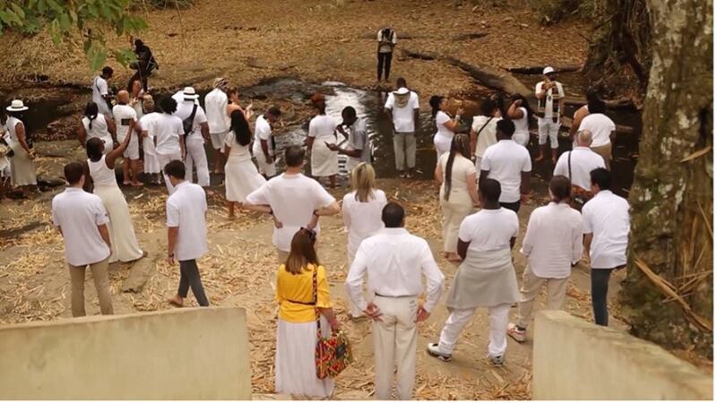 Participants of the Amos C. Brown Fellowship to Ghana visit the Assin Manso Ancestral Slave River in Ghana in January 2025, where slaves were forcefully bathed before making the long trek to the Cape Coast Castles slave dungeons.