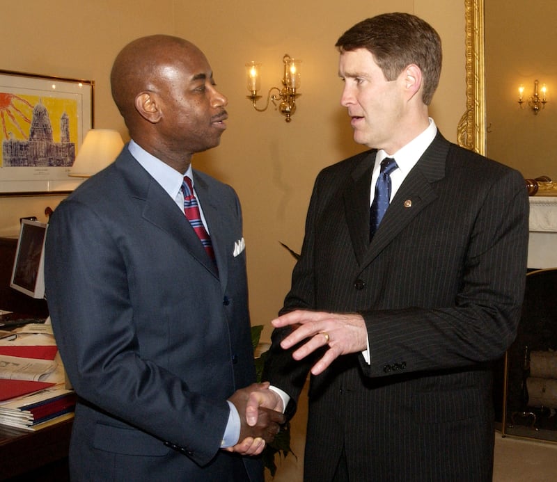Rear Adm. Barry C. Black, left, meets with Senate Majority Leader Bill Frist, R-Tenn., after being named as the new Senate chaplain, the first black and first military chaplain to hold the job, on Tuesday June 17, 2003, on Capitol Hill in Washington.