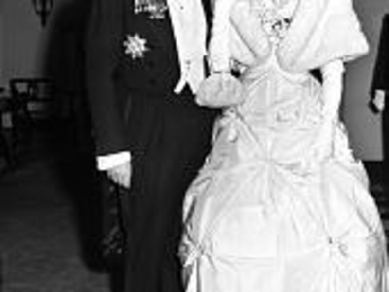 Prince Rainier III and Grace Kelly leave her New York apartment Jan. 6, 1956, for a ball at the Hotel Waldorf-Astoria a day after announcing their engagement.