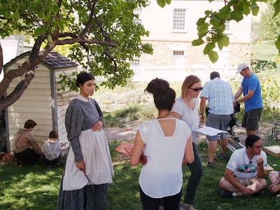 Behind the scenes of filming "In Emma's Footsteps." Actress Shona Kay Moyer, left, plays Emma Smith.