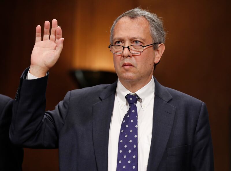 FILE - In this Sept. 20, 2017, file photo, Thomas Farr is sworn in during a Senate Judiciary Committee hearing on his nomination to be a District Judge on the United States District Court for the Eastern District of North Carolina, on Capitol Hill in Wash