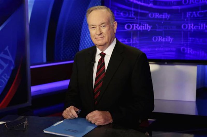 Host Bill O'Reilly of "The O'Reilly Factor" program, on the Fox News Channel, poses for photos, in New York, Thursday, Oct. 1, 2015. (AP Photo/Richard Drew)