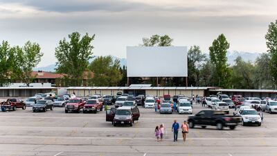 Moviegoers arrive early for a Saturday night showing of "Avengers: Infinity War" at the Redwood Drive-In Theatre in West Valley City in May 2018.