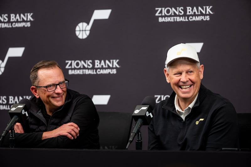 Utah Jazz general manager Justin Zanik and Utah Jazz CEO Danny Ainge talk to journalists during an end-of-season press conference.