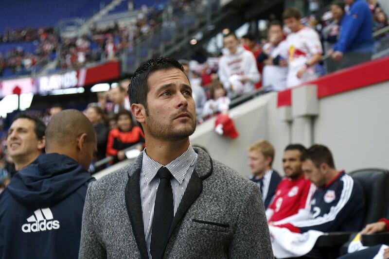 New York Red Bulls head coach Mike Petke looks on before the start of an MLS soccer game against the Colorado Rapids, Saturday, March 15, 2014, in Harrison, N.J. (AP Photo/Julio Cortez)