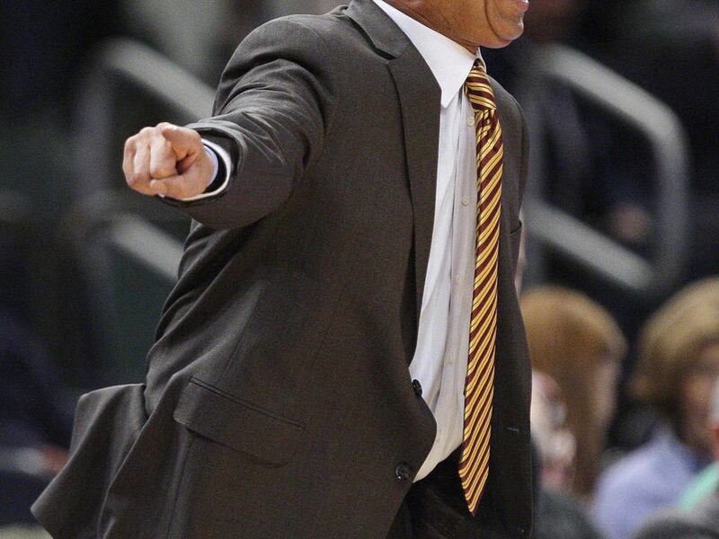 Minnesota coach Tubby Smith calls out to his team during the second half of an NIT college basketball tournament semifinal against Washington, Tuesday March 27, 2012, in New York. Minnesota won 68-67.
