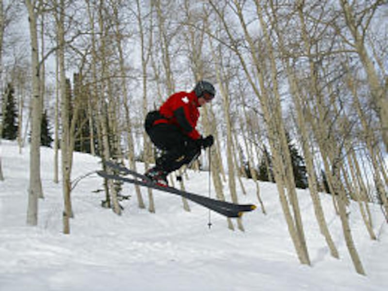 Ski patrolman Brent Molsberry skis down expert terrain through the forest glades in the Sultan area at Deer Valley Resort in Park City.