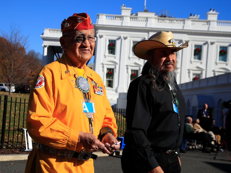 Navajo Code Talker Thomas Begay and retired U.S. Army Col. Ronald Begay tour the White House.