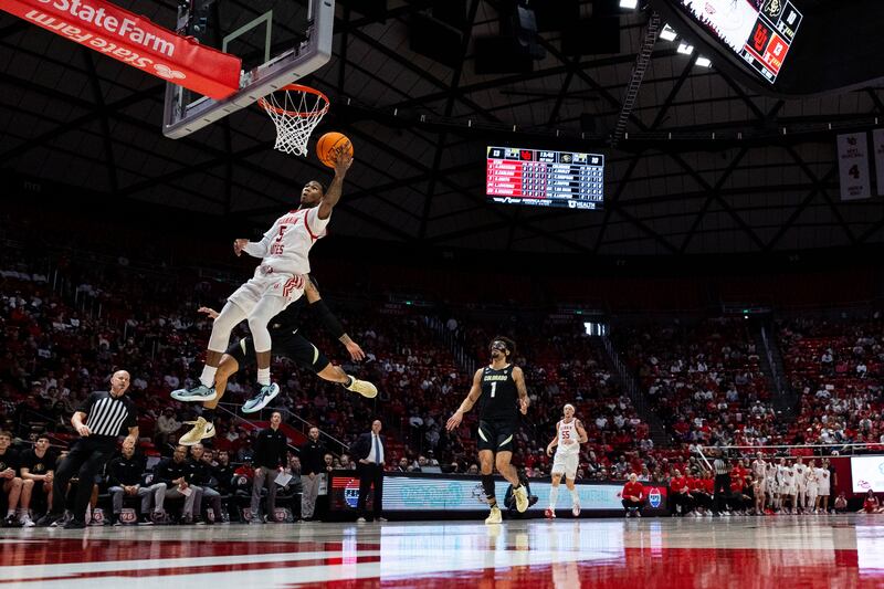 Utah Runnin’ Utes guard Deivon Smith shoots during a game against Colorado at the Jon M. Huntsman Center in Salt Lake City on Saturday, Feb. 3, 2024.