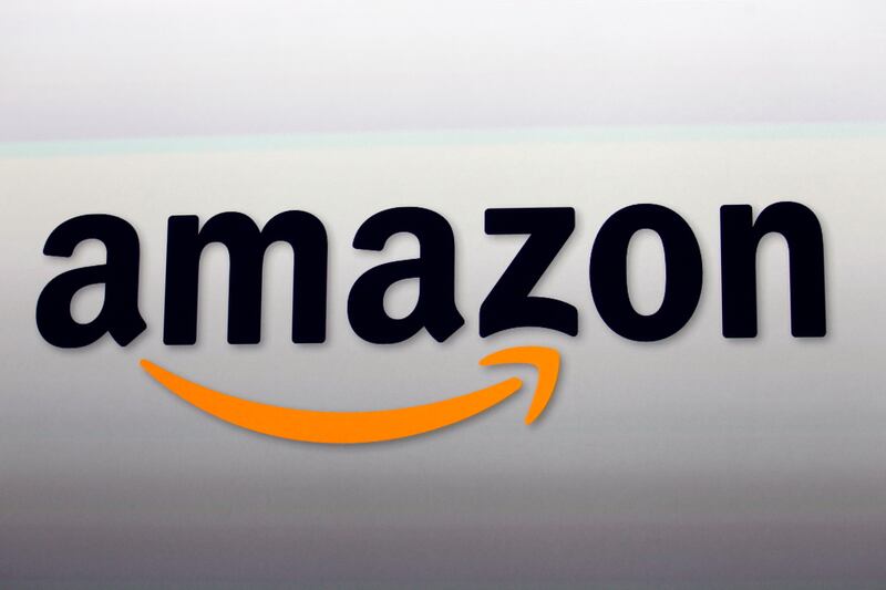 FILE - This Sept. 6, 2012, file photo shows the Amazon logo in Santa Monica, Calif. Amazon announced Thursday, Jan. 18, 2018, that it has narrowed down its potential site for a second headquarters in North America to 20 metropolitan areas, mainly on the E