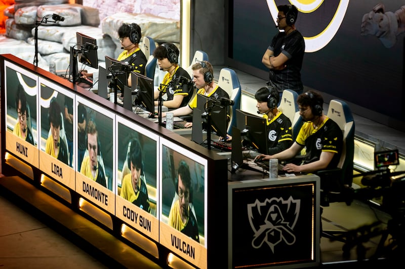 Participants compete on their computers during the group stage of the ‘League of Legends’ world championships in Berlin, Germany, Sunday, Oct. 13, 2019. (Christoph Soeder/dpa via AP)