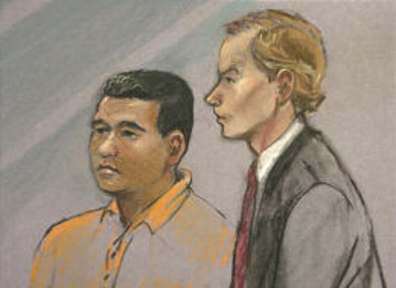 Courtroom artist drawing shows Ahmed Fathy Mehalba, left, with his attorney Michael Andrews Tuesday in U.S. District Court in Boston. He worked as a translator at the U.S. prison at Guantanamo Bay.