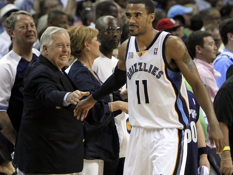 Memphis Grizzlies guard Mike Conley (11) is congratulated by team owner Michael Heisley in the final minutes of the second half of Game 6 against the San Antonio Spurs in a first-round NBA basketball series on Friday, April 29, 2011, in Memphis, Tenn. The