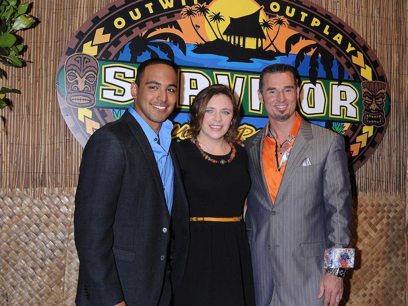 Albert Destrade, left, Sophie Clarke and Benjamin 'Coach' Wade, right, arrive at the "Survivor: South Pacific" finale and reunion show held at CBS Television City on stage 46 on Dec. 18, 2011 in Los Angeles, Calif. Clarke beat Wade and Destracde to win "