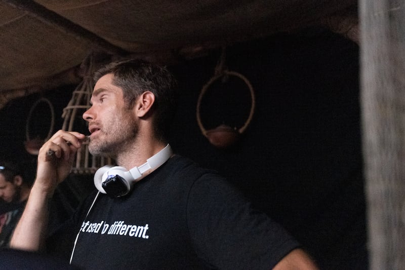 Dallas Jenkin, creator, producer, writer and director of “The Chosen,” works during filming in Midlothian, Texas, on Aug. 15, 2022.