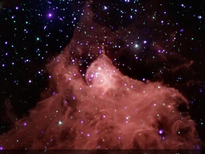 The Cephus B molecular cloud, a nebula star-forming region 2,400 light-years from Earth. Our own star condensed out of such a cloud of gas, mostly hydrogen. The Hypatia Stone was part of the material in the nebula. Photo composite of X-ray and visual tele