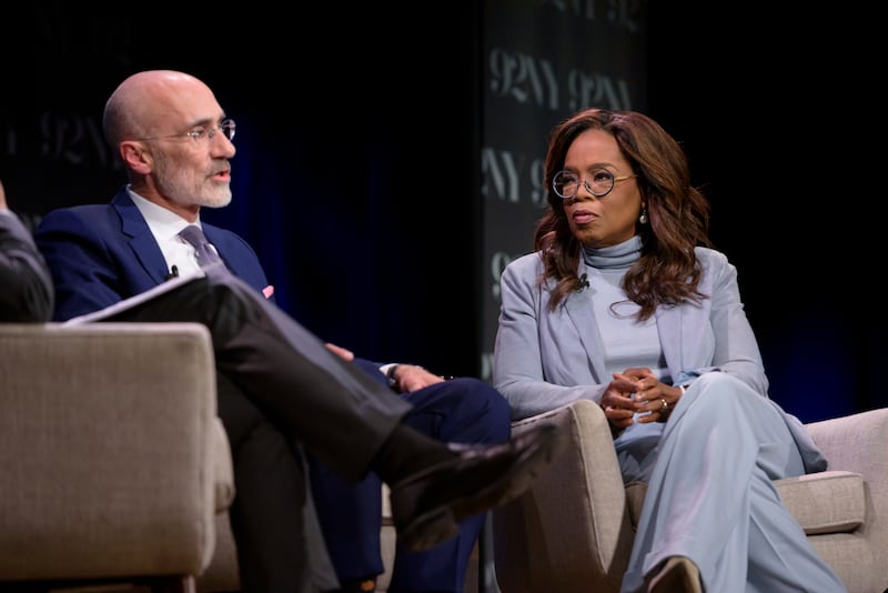 Arthur C. Brooks, left, and Oprah Winfrey discusses their new book “Building the Life You Want: The Art and Science of Getting Happier” on Sept. 12, 2023.