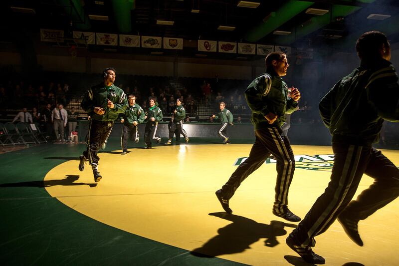 The Utah Valley wrestling team warms up at UVU's Lockhart Arena prior to defeating Oklahoma on Feb. 2.