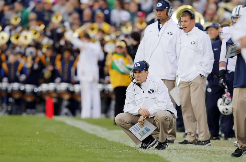 Brandon Doman watches the game as BYU and Notre Dame play Saturday, Oct. 20, 2012 in South Bend.