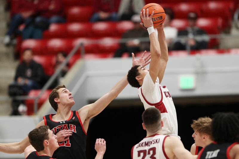 Washington State guard Myles Rice, right, secures a rebound next to Utah guard Luka Tarlac during the second half of an NCAA college basketball game Wednesday, Jan. 24, 2024, in Pullman, Wash.