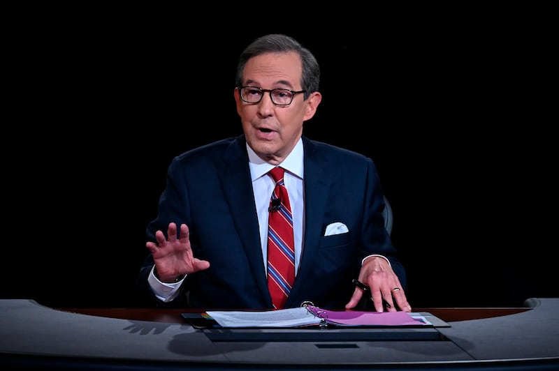 Moderator Chris Wallace of Fox News speaks as President Donald Trump and Democratic presidential candidate former Vice President Joe Biden participate in the first presidential debate in Cleveland on Sept. 29, 2020. Wallace says he’s leaving the network after 18 years and is “ready for a new adventure.” Wallace made the announcement, Sunday, Dec. 12, 2021, at the end of the weekly news show he moderates, “Fox News Sunday.”