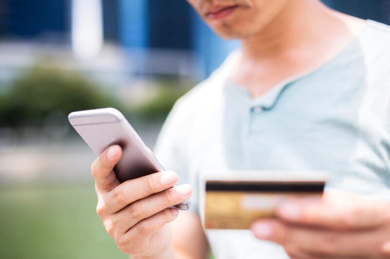 The boss says get a credit card. Dave Ramsey says hold on now.