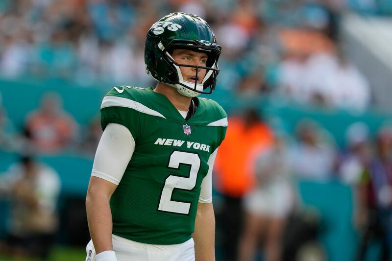 New York Jets quarterback Zach Wilson stands on the field during game against the Miami Dolphins, Sunday, Dec. 17, 2023, in Miami Gardens, Fla.
