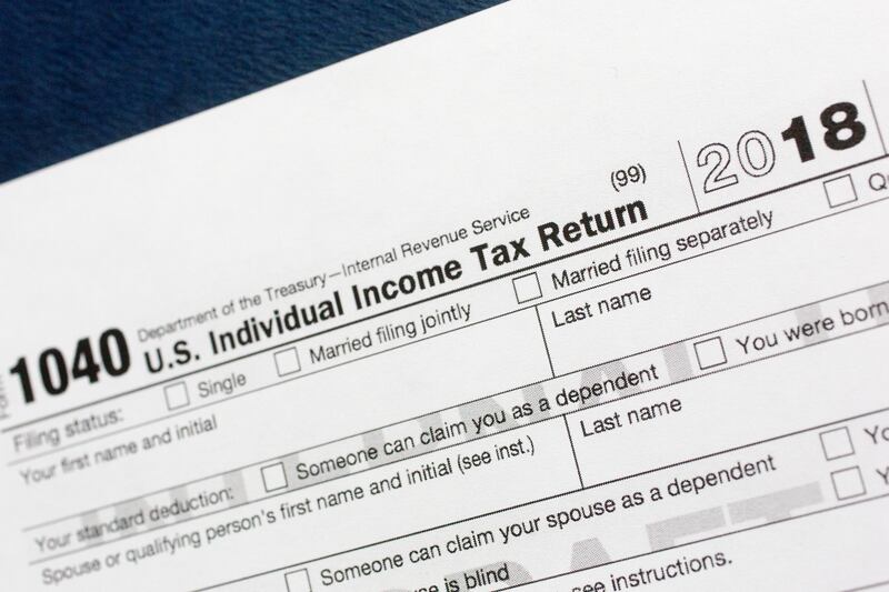 A portion of the 1040 U.S. individual income tax feturn form for 2018 is pictured in New York on July 24, 2018.