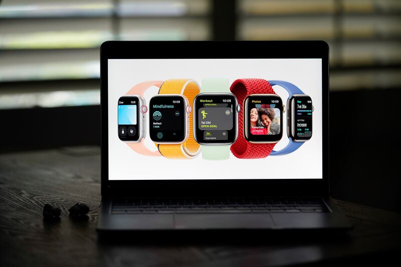 New Apple Watch Series 7 models are shown on a screen in La Habra, Calif.