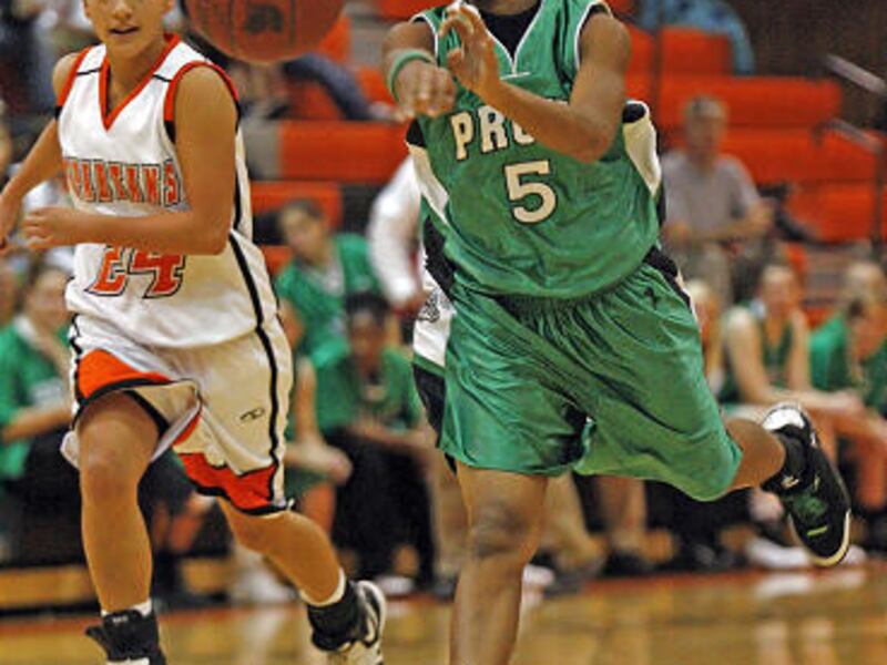 Provo's Vanna Cox passes past Murray's Amy Murakami on Tuesday in Murray. Provo improved on its earlier weaknesses, winning 48-36.