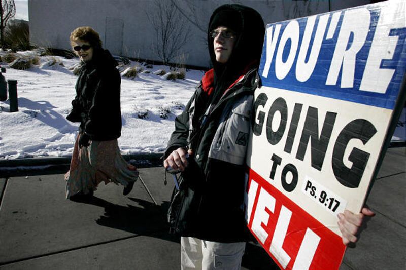 David Hockenbarger, 17, of the Westboro Baptist Church pickets on a Salt Lake corner on Saturday.