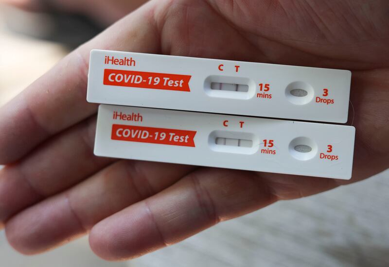 COVID-19 antigen rapid tests indicate positive results in Salt Lake City on Aug. 15, 2023.