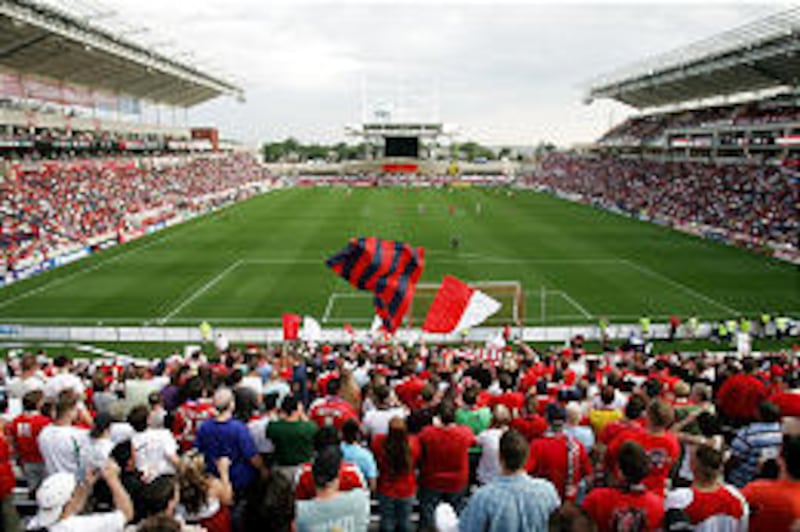 Fans watch as the Chicago Fire open their new stadium, Toyota Park, with a game between the Fire and New York last Sunday. Chicago hosted RSL Wednesday.
