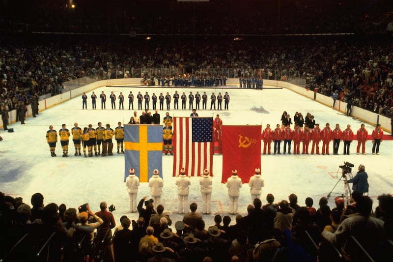 The U.S., Swedish and Soviet hockey teams line up to receive their Olympic medals in Lake Placid, N.Y., on Feb. 24, 1980.