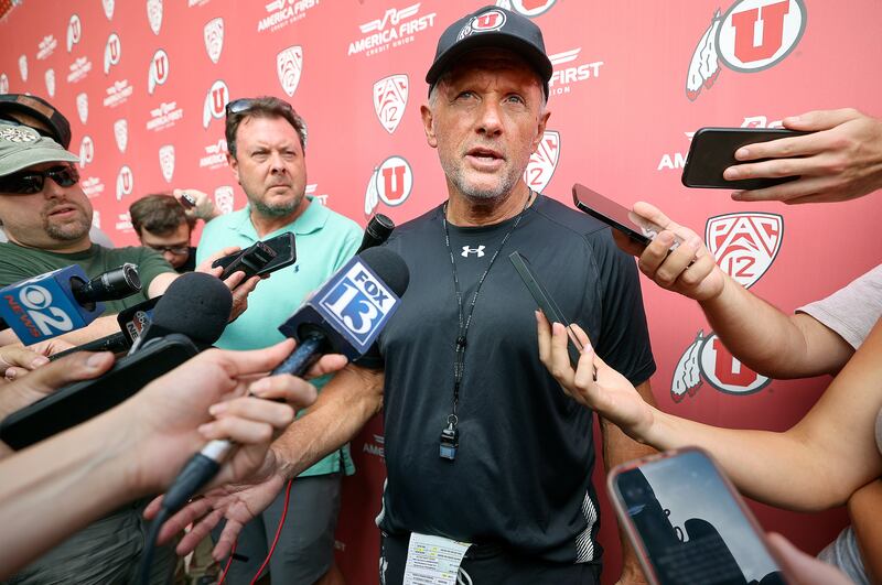 University of Utah head football coach Kyle Whittingham talks to members of the media.