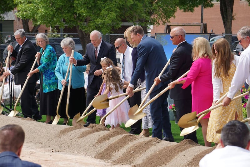 Elder Ryan K. Olsen, center, joins with local members at the groundbreaking ceremony of the Montpelier Idaho Temple on Saturday, June 17, 2023.