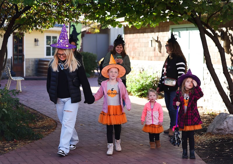 Mothers and daughters walk around Gardner Village in West Jordan on Friday, Oct. 27, 2023.