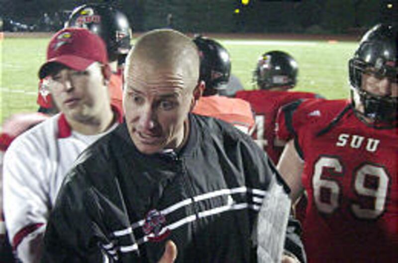 New Southern Utah coach Gary Andersen, center, believes he can win by recruiting mostly Utah high school players to the Cedar City campus.