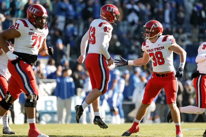 Utah Tech kicker Connor Brooksby (43) celebrates after kicking a 47-yard field goal, putting his team up 3-0 over BYU.