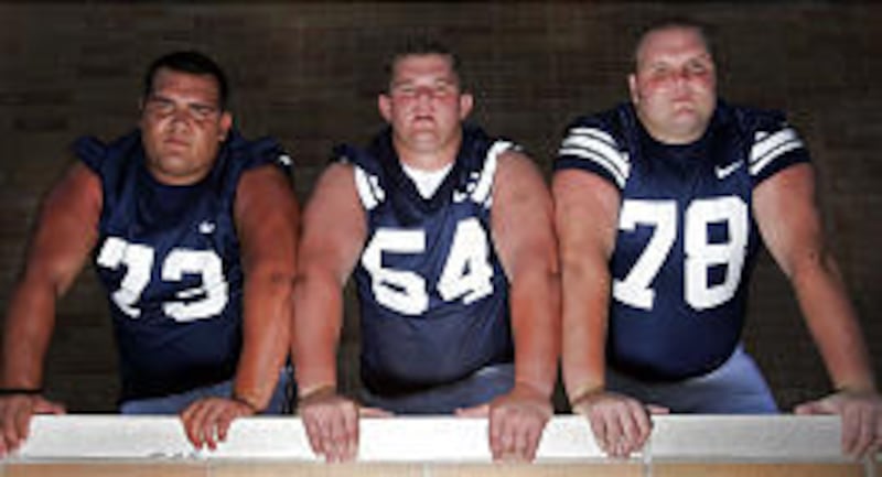 Jake Kuresa (73), Lance Reynolds (54) and Brian Sanders (78) are all returning starters on the Cougar offensive line, which should be one of the team's strengths.