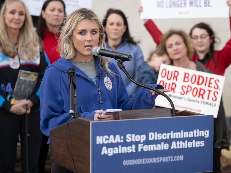 Former University of Kentucky swimmer Riley Gaines speaks during a rally outside of the NCAA Convention in San Antonio.