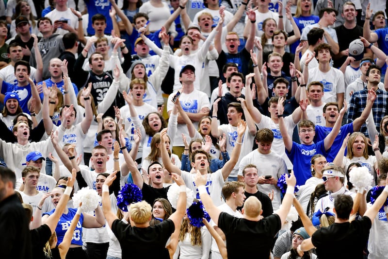 BYU Cougars students and fans sing “YMCA” during a timeout as BYU and Fresno State play at the Delta Center in Salt Lake City on Dec. 1, 2023.